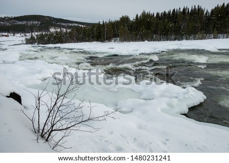 waterfall Storforsen in the winter, Sweden