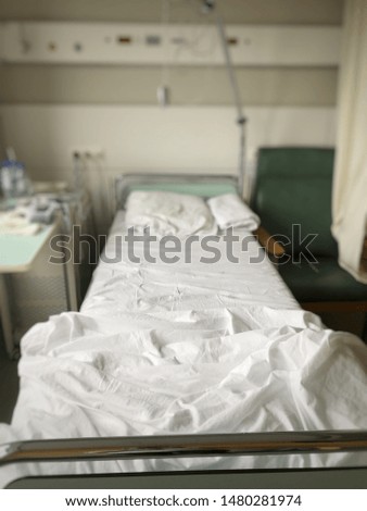 blurred image of patient bed at a hospital with an equipment for treatment.   