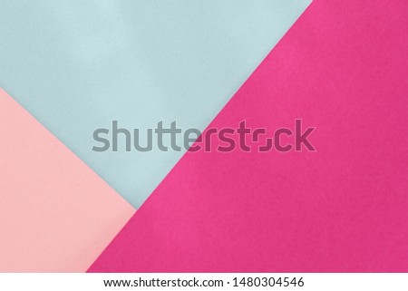 Pink blue purple paper background. Geometric figures, shapes. Abstract geometric flat composition. Empty space on monochrome cardboard.