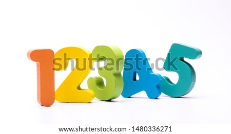 Colorful wooden numeric arranged next to each other white background. Royalty-Free Stock Photo #1480336271