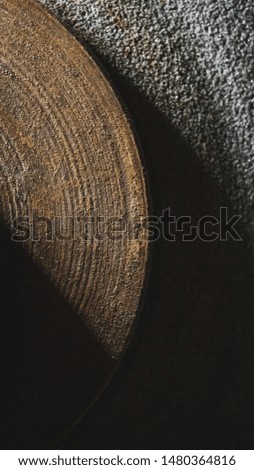 Grinding wheel. The rough surface of an old grinding wheel. Old industrial equipment.