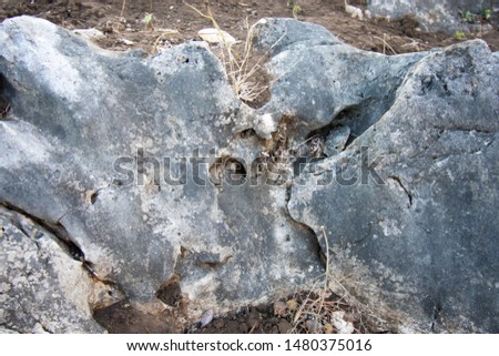 Granular limestone rock surface. Roe stone rock surface. Limestone crag texture. Roe-stone crag face. Limestone stone surface desktop pattern. Calcite crag idle screen. Calcspar reef desktop backdrop