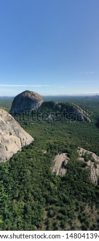 Beautiful pano view of a Valley with huge rocks in the country side of Brazil 