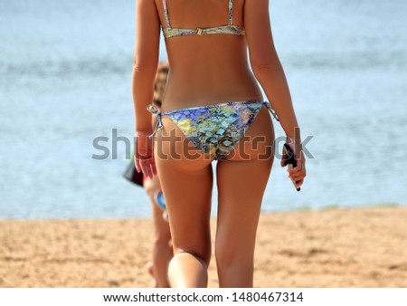Woman on the beach in summer