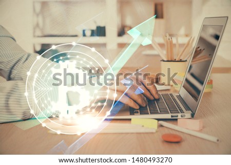 Blockchain theme hud with businessman working on computer on background. Concept of crypto chain. Double exposure.