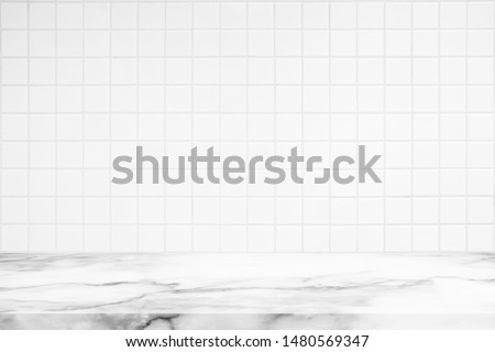 Abstract Luxury White Marble Table with Kitchen Wall Tiles Texture Background.