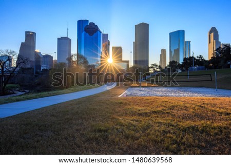 Sunrise at Downtown Houston, Texas Skyline with modern skyscrapers and star sunshine in the early morning