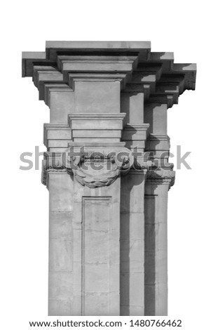 Elements of architectural decorations of buildings, columns, pommel and arches, plaster moldings, plaster patterns. On the streets in Spanish, public places. Black and white retro style photo.