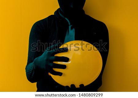 silhouette person background orange subject black