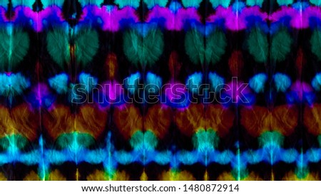 Ikat Ogee abstract black ink background with tie dye pattern. Modern watercolour banner template. Fragment of artwork. Spots of acrylic paint. Dark texture background.