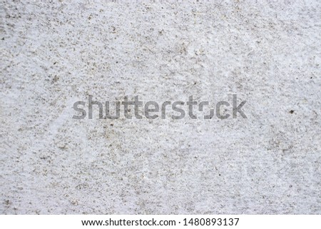 Concrete wall white paint subtle surface worn vintage background texture