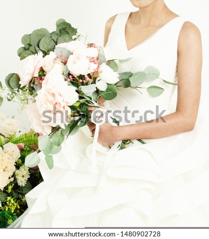 bridal bouquet of flowers in hands of the bride. Royalty-Free Stock Photo #1480902728