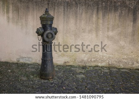 Historic fire hydrant in a street.