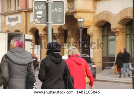 People walking in a autumn day