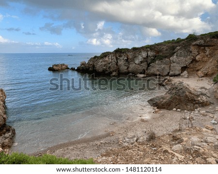 Seascape, rocky beach in Italy