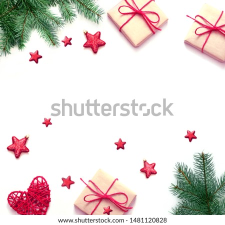Christmas composition. Gift, fir, Christmas hat and sweet crutch on white background. Christmas, winter, new year concept. Flat lay, top view, copy space.