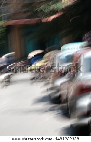 Very blur cars in traffic that shows movement 