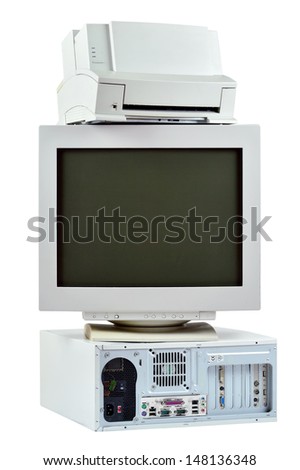 Obsolete PC commuter, printer and CRT monitor. Stack of old, used computer, monitor and printer, electronic waste isolated on white background.