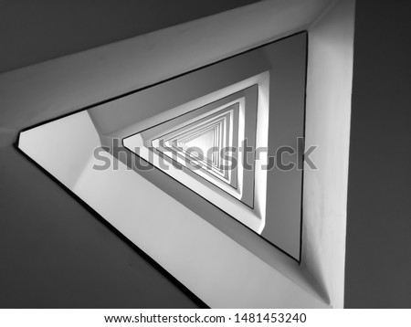 Black and white triangle spiral pattern minimal modern architecture abstract Royalty-Free Stock Photo #1481453240