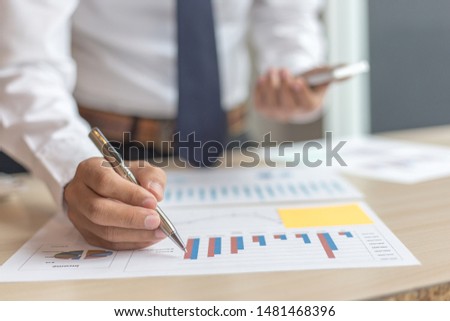 The professional investor, businessman Executives are working and analyzing project statistics result in report investment and planning strategic marketing, financial and accounting concept