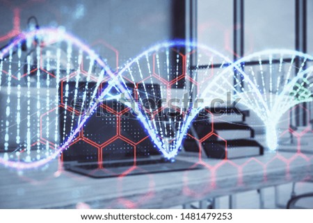 DNA hologram with desktop office background. Double exposure. Concept of education