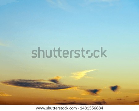 Minimalist cloudscape on a calm summer evening