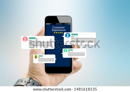 customer experience,review concept.Hands holding mobile phone Royalty-Free Stock Photo #1481618135