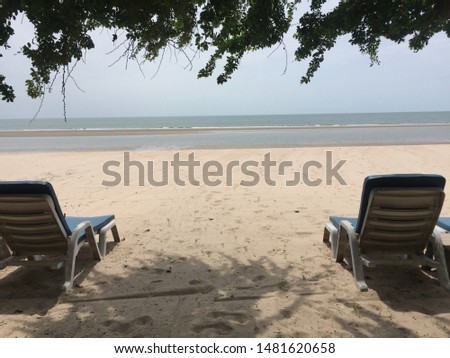 Beautiful beach chair in Thailand background