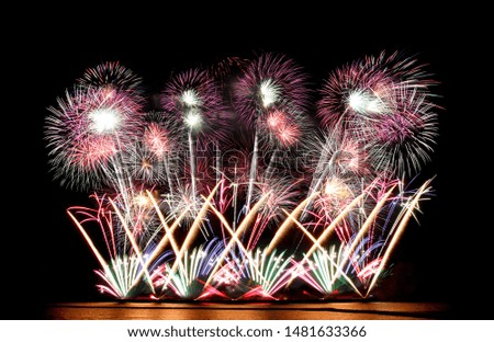 Variety of colors Mix Fireworks or firecracker in the darkness background. 