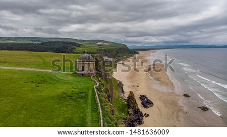Aerial view of Mussenden Temple which  is a building located on cliffs and above the Atlantic Ocean. Castlerock, Co Derry, Northern Ireland.