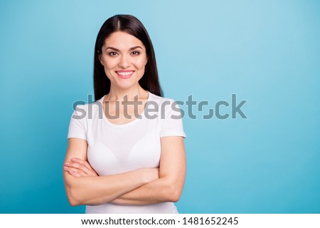 Photo of smart kind friendly business woman showing her cleverness while isolated with blue background