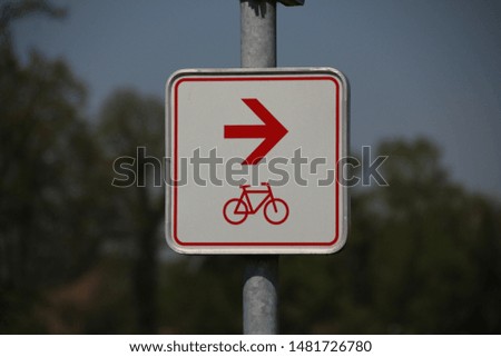 sign for bicycles and blue sky background