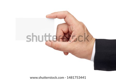 close up of  a male hand holding blank note card sign on white background
