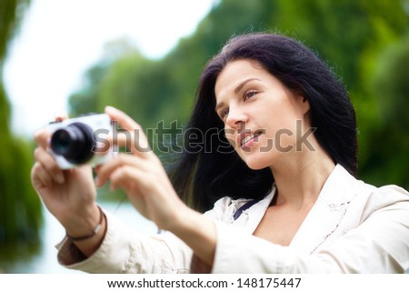 Nice woman making photo