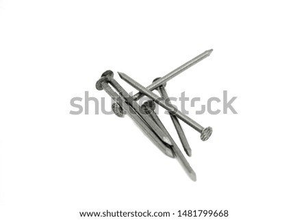 Photo in a light box with white studio light on some DIY steel nails