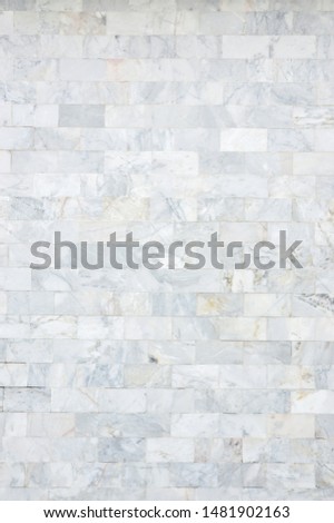 White Marble wall pattern texture. Brick wall made from marble use as texture and background.
