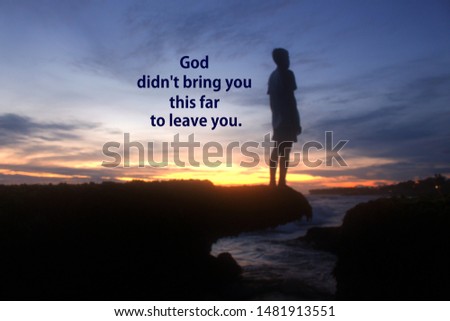 Spirituality inspirational quote - God did not bring you this far to leave you. With blurry image of young boy silhouette stands alone on sea rock. Beautiful dramatic sunset sky colors background.
