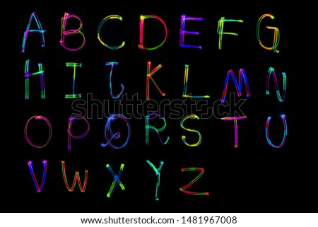Neon font colorful glowing Alphabet, Light Painting Alphabet slow speedshutter.