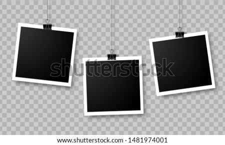 Set of empty photo frames hanging on a clip isolated on transparent background.  Photography art. Template or mockup for design.