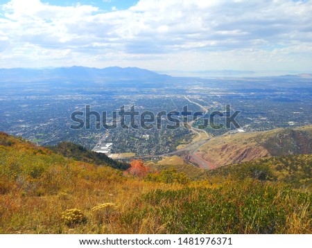 Downtown Salt Lake City and Oqquirh Mountains from the Wasatch foothills in early fall