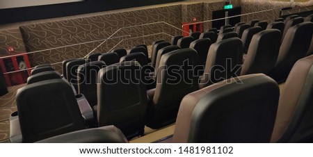 Stock photos, pictures and royalty-free images of movie theater auditorium viewers seating chairs