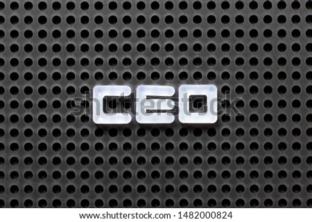 Black color pegboard with white letter in word CEO (abbreviation of Chief Executive Officer) 