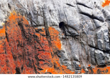 Close up view on detailed concrete walls with paint and cracks in high resolution
