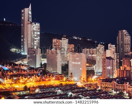 Night photography of the city of Benidorm, Alicante, Spain, its skyscrapers and the viewpoint of the Cross. Deloix area