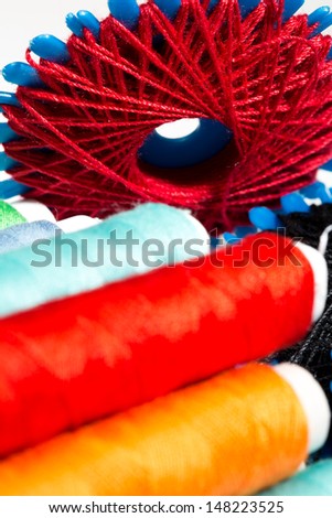 different colored sewing threads  