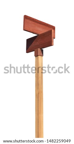 Old rustic or vintage blank wooden street sign on pole mockup or mock up isolated on white background including clipping path