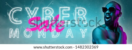 Cyber monday, sales, purchases concept. Neon lighted letters on gradient background. Astonished man calling. Negative space. Modern design. Contemporary art. Creative conceptual and colorful collage.