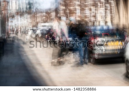 Street abstract - long exposure of people on the high street - intentional camera shake to introduce an impressionistic effect and light trails - creative filter applied