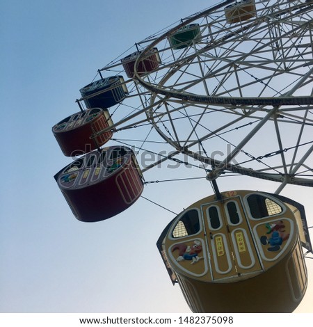 The ferris wheel goes round and round Royalty-Free Stock Photo #1482375098