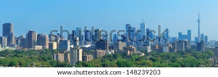 Toronto skyline panorama with urban architecture and blue sky